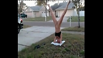 Teen Girl Performs Headstand In The Public